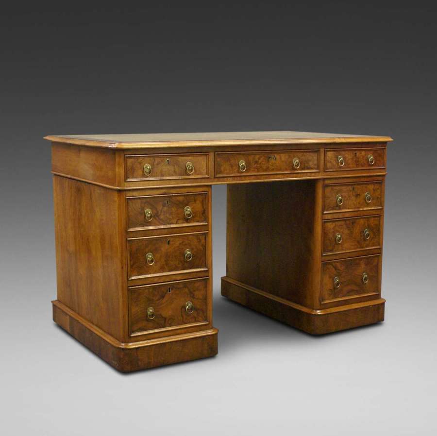 19th Century figured walnut nine drawer pedestal desk