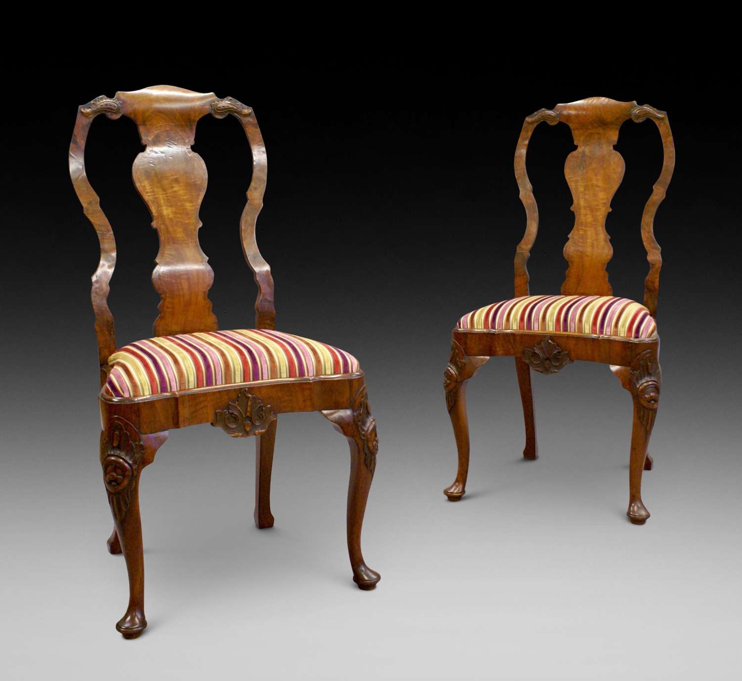 Pair of George I style walnut carved cabriole leg side chairs