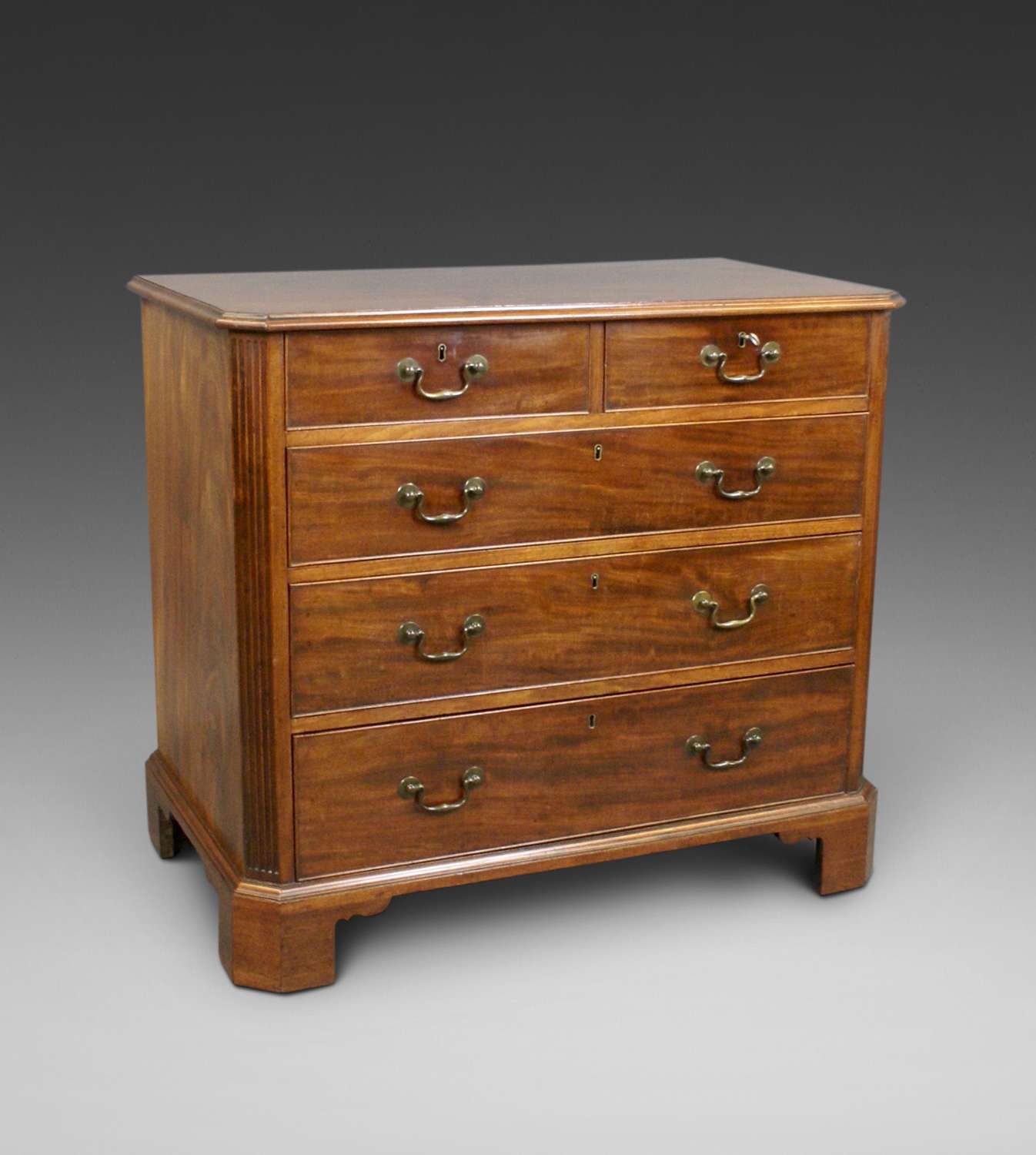 A George III Chippendale period mahogany chest of drawers