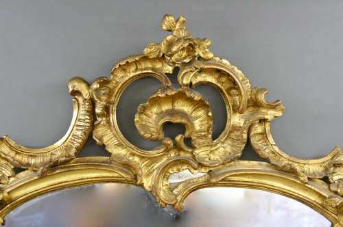 A large 19th Century carved giltwood wall mirror