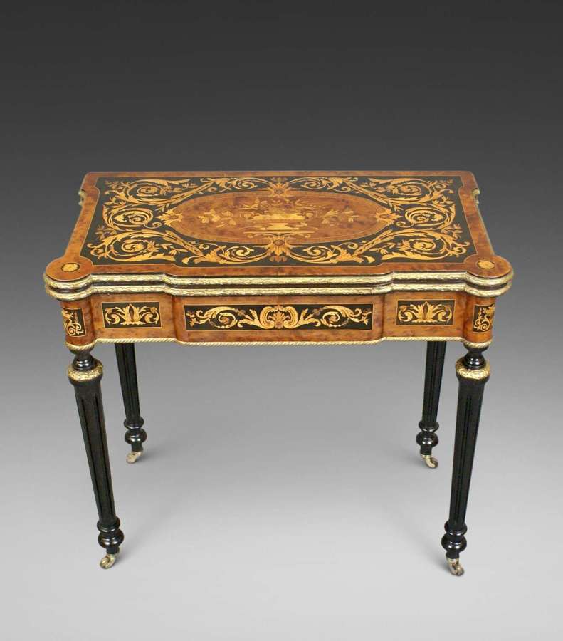 A 19th Century Inlaid and ormulu mounted card table