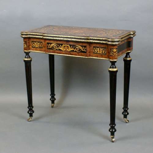 A 19th Century Inlaid and ormulu mounted card table