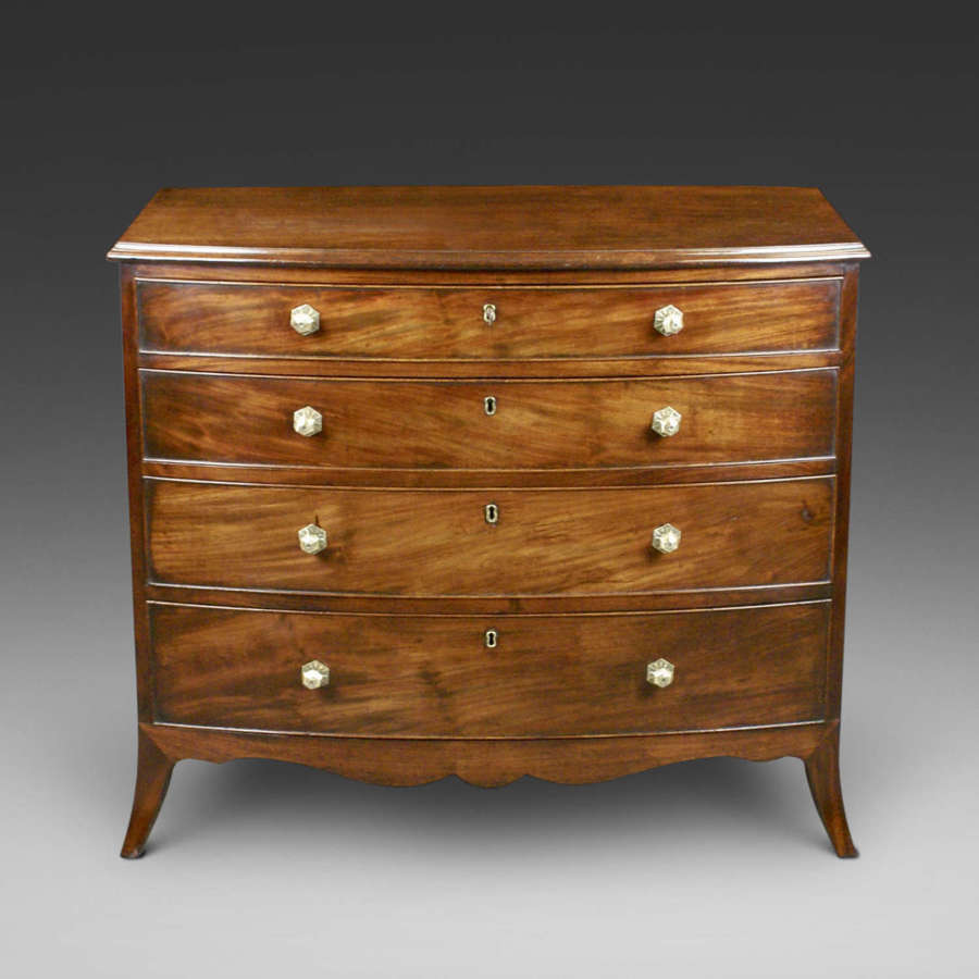 A George III period four drawer mahogany bow- fronted chest
