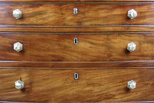 A George III period four drawer mahogany bow- fronted chest