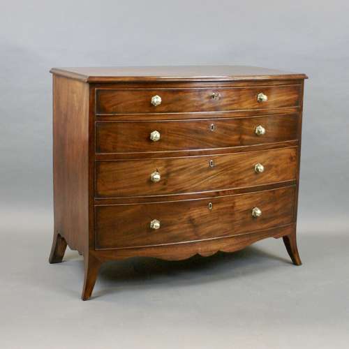 A George III period four drawer mahogany bow- fronted chest