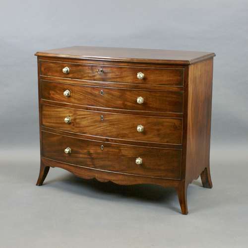 A George III period four drawer mahogany bow- fronted chest