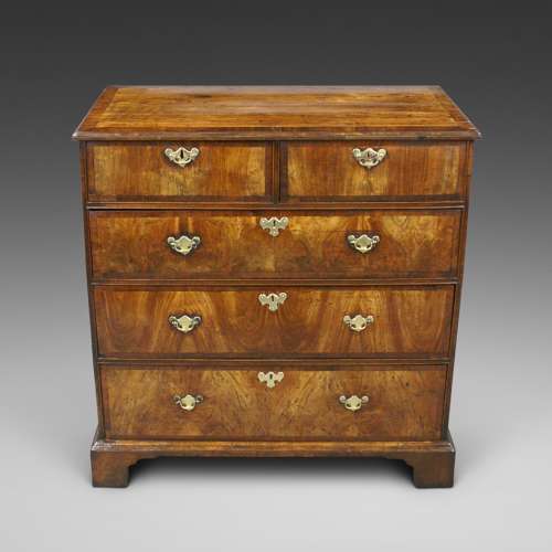 An early 18th Century walnut five drawer chest