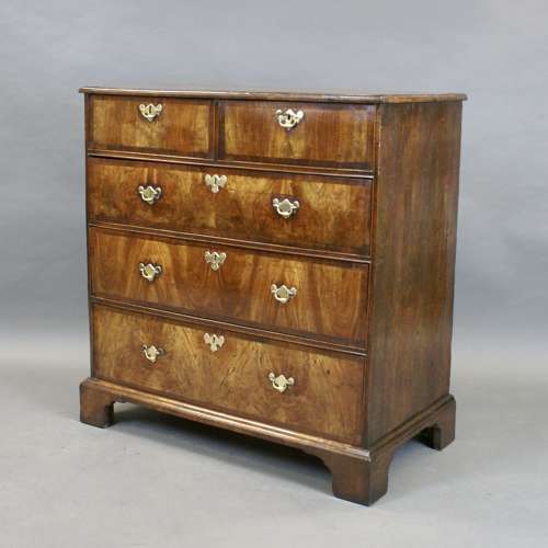 An early 18th Century walnut five drawer chest