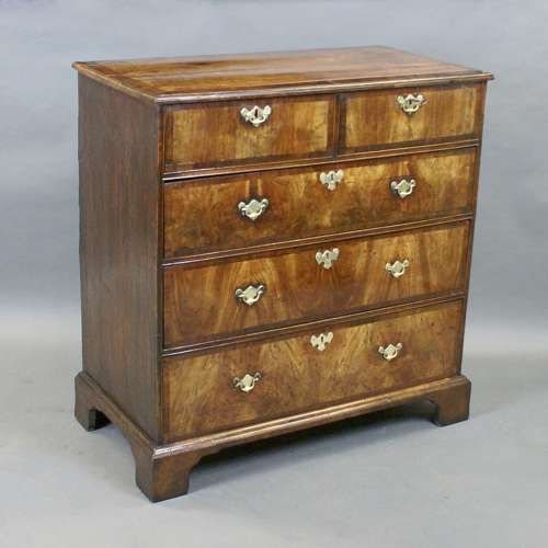 An early 18th Century walnut five drawer chest
