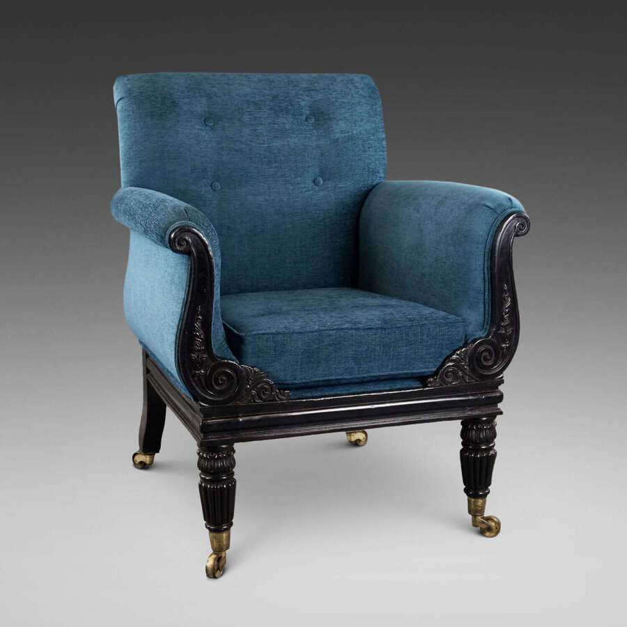 A later Regency period ebonised armchair