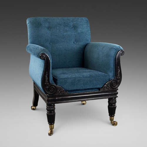A later Regency period ebonised armchair
