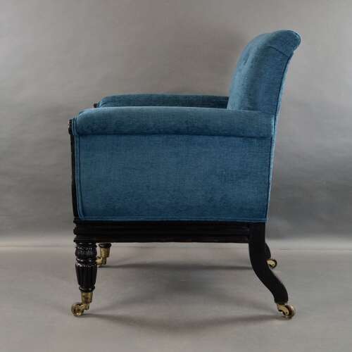 A later Regency period ebonised armchair