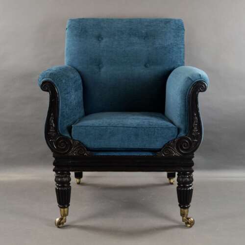 A later Regency period ebonised armchair