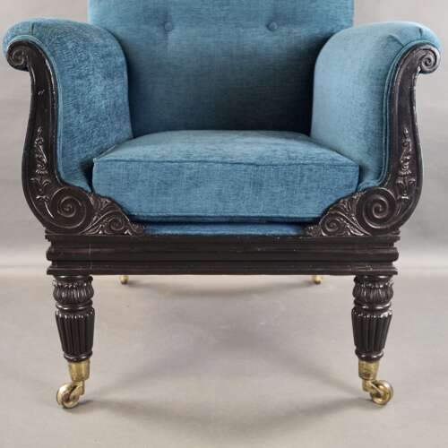 A later Regency period ebonised armchair