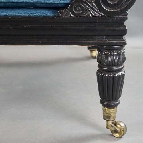 A later Regency period ebonised armchair