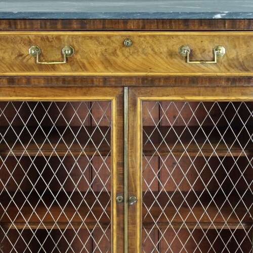 Later George III period four door bow-ended side cabinet.