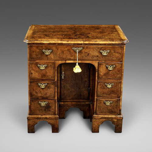 A rare burr oak knee-hole desk