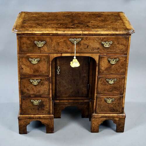 A rare burr oak knee-hole desk