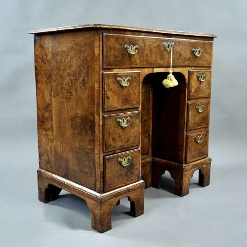 A rare burr oak knee-hole desk
